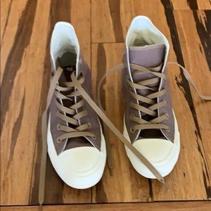 Tan Converse high top sneakers